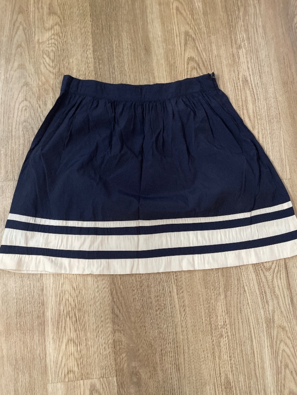 Navy skirt with white striped detail